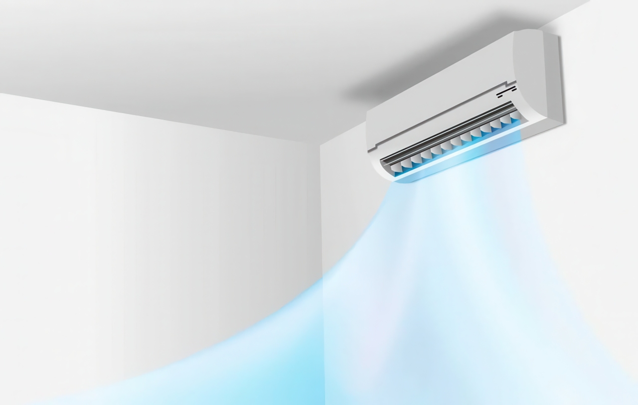 A white wall-mounted air conditioning unit with open horizontal vents releases visible blue cool air downward into a minimalist white room, illustrating how long should ac run for during operation.